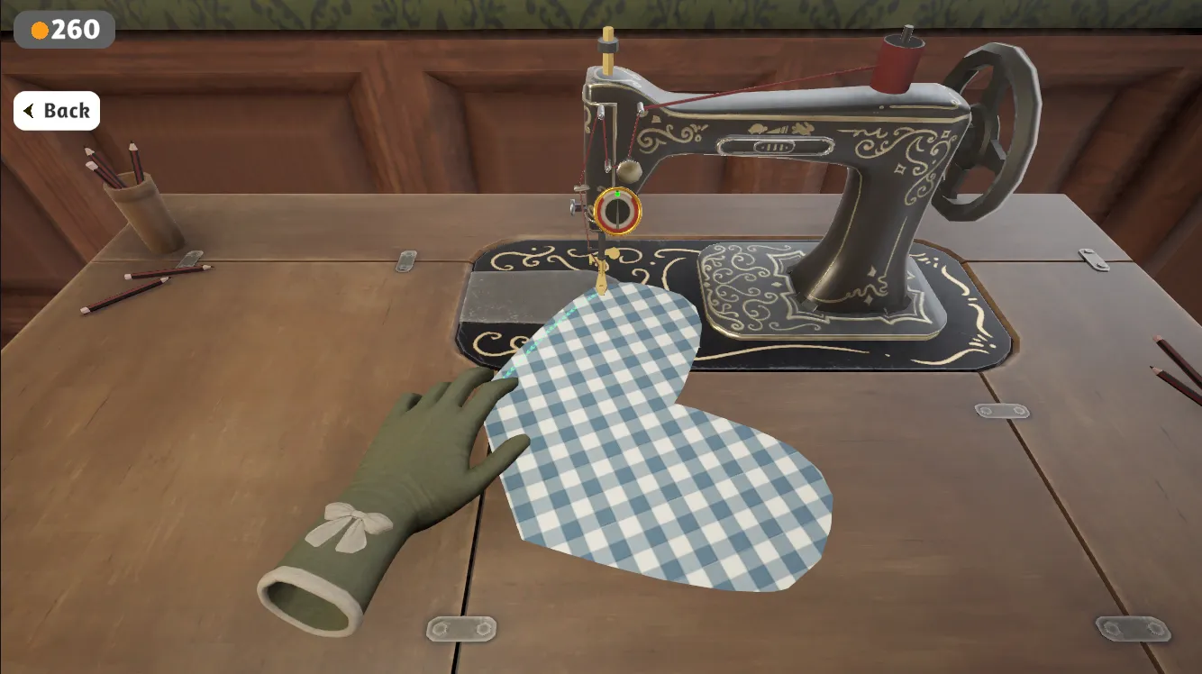 Treadle sewing machine stitching a blue gingham panel